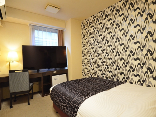 Imagen de la habitación del Hotel Apa Osaka Kadomashi Ekimae. Foto 6