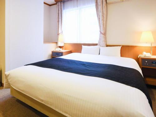 Imagen de la habitación del Hotel Apa Sapporo Susukino Stationnishi. Foto 3