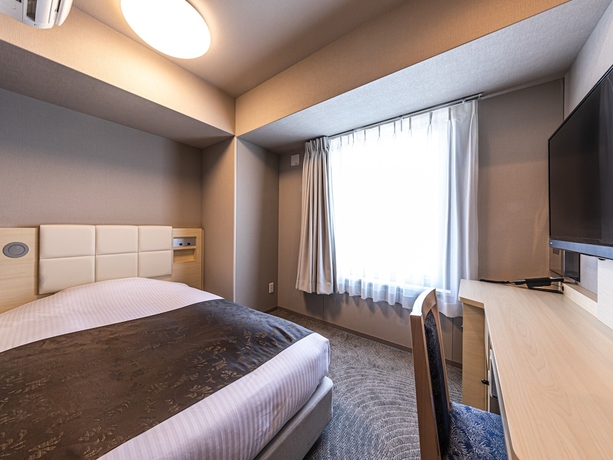 Imagen de la habitación del Hotel Apa Shin-osaka Eki Tower. Foto 6