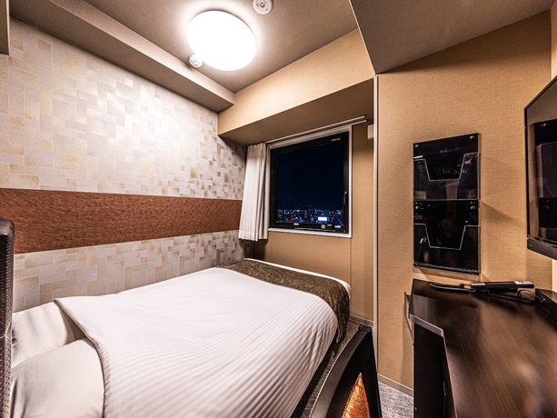 Imagen de la habitación del Hotel Apa Shin-osaka Eki Tower. Foto 8