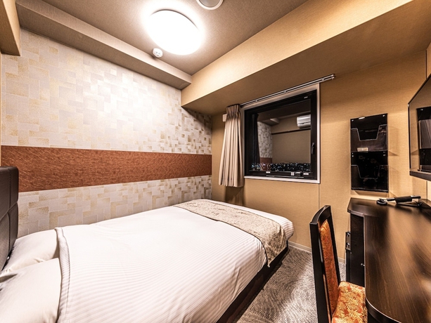 Imagen de la habitación del Hotel Apa Shin-osaka Eki Tower. Foto 12