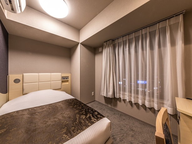 Imagen de la habitación del Hotel Apa Shin-osaka Eki Tower. Foto 13