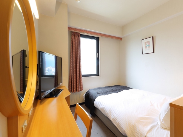 Imagen de la habitación del Hotel Apa Tonami-ekimae. Foto 2