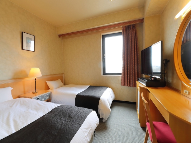 Imagen de la habitación del Hotel Apa Tonami-ekimae. Foto 4