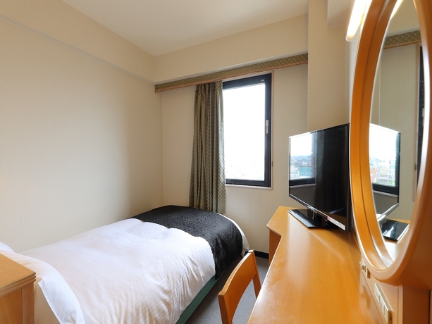 Imagen de la habitación del Hotel Apa Tonami-ekimae. Foto 10