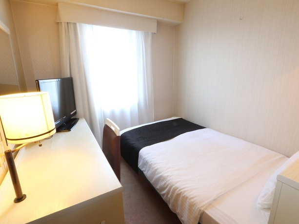 Imagen de la habitación del Hotel Apa Toyama. Foto 2