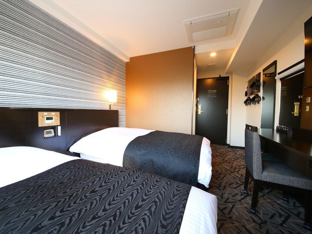 Imagen de la habitación del Hotel Apa and Resort Tokyo Bay Makuhari. Foto 3