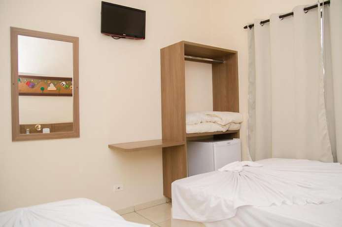 Imagen de la habitación del Hotel Aparecida. Foto 8
