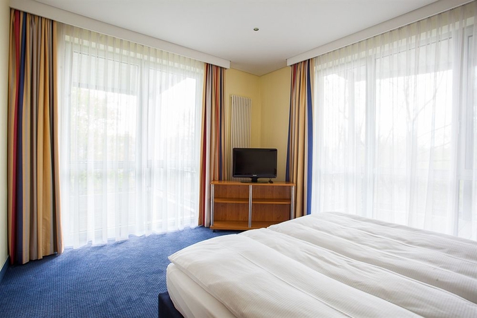 Imagen de la habitación del Hotel Aparion Berlin. Foto 16