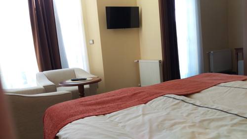 Imagen de la habitación del Hotel Apart Akropolis. Foto 16
