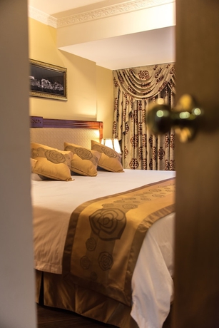 Imagen de la habitación del Hotel Apart El Doral. Foto 12