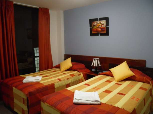 Imagen de la habitación del Hotel Apart El Peregrino. Foto 9