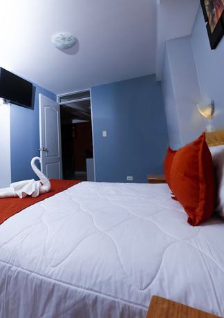 Imagen de la habitación del Hotel Apart El Peregrino. Foto 12