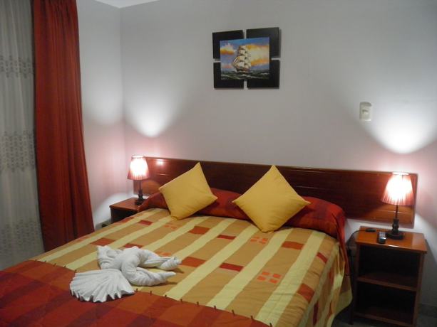 Imagen de la habitación del Hotel Apart El Peregrino. Foto 13