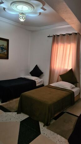 Imagen de la habitación del Hotel Apart Larbi. Foto 13