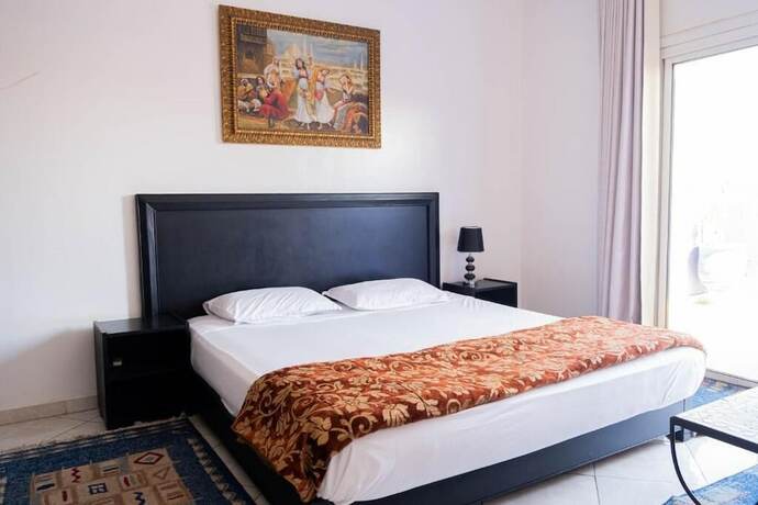 Imagen de la habitación del Hotel Apart Larbi. Foto 15