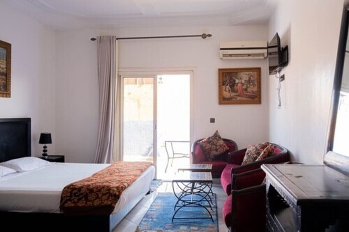 Imagen de la habitación del Hotel Apart Larbi. Foto 17