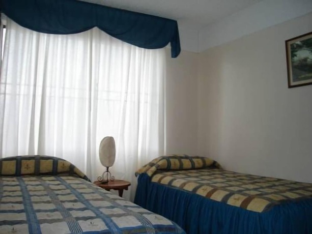 Imagen de la habitación del Hotel Apart Punto Real. Foto 9