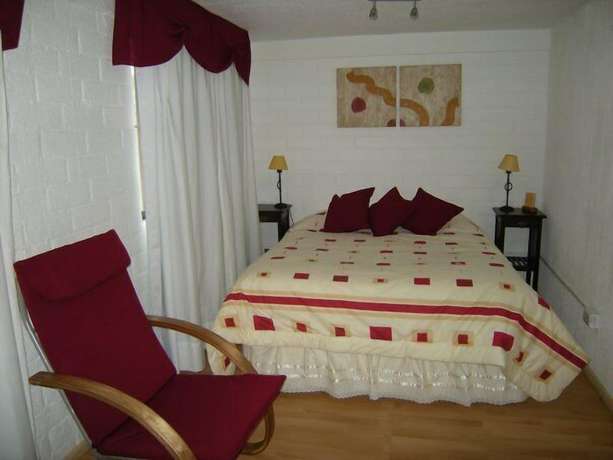 Imagen de la habitación del Hotel Apart Punto Real. Foto 14