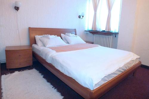 Imagen de la habitación del Hotel ApartKopaonik. Foto 8