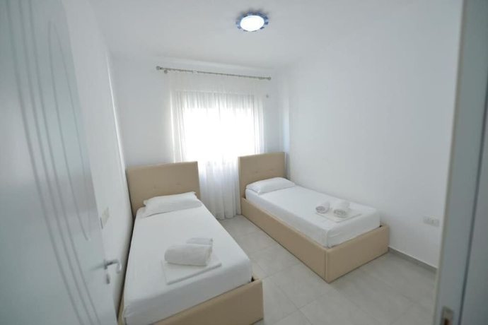 Imagen de la habitación del Hotel ApartMiramare Sarande. Foto 5