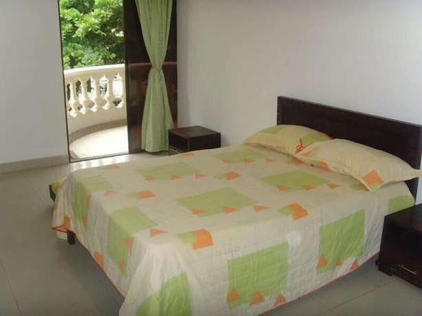 Imagen de la habitación del Hotel Aparta Roca Marina. Foto 9