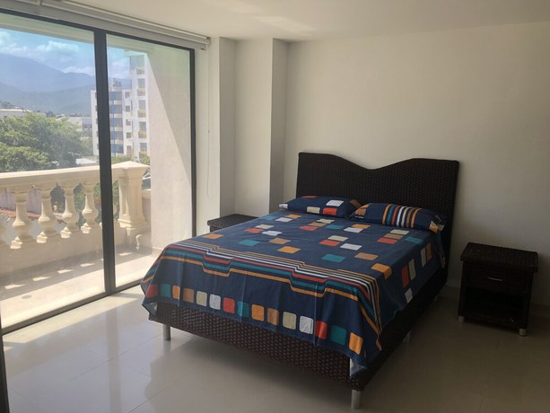 Imagen de la habitación del Hotel Aparta Roca Marina. Foto 13