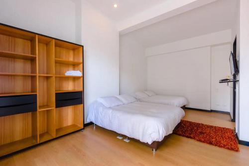 Imagen de la habitación del Hotel Aparta Suite Edificio Continental Bogotá. Foto 15