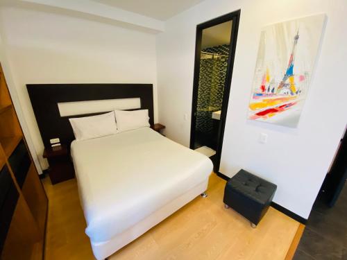 Imagen de la habitación del Hotel Aparta Suite Edificio Continental Bogotá. Foto 16