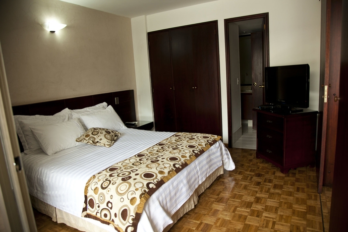 Imagen de la habitación del Hotel Aparta Suites Torre Poblado. Foto 2