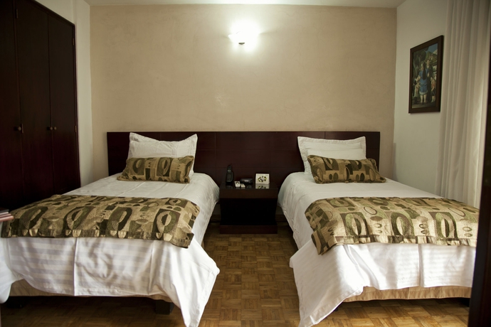 Imagen de la habitación del Hotel Aparta Suites Torre Poblado. Foto 10