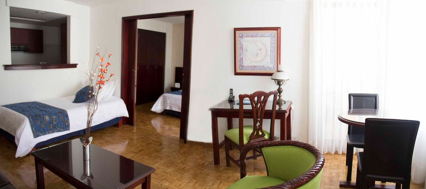 Imagen de la habitación del Hotel Aparta Suites Torre Poblado. Foto 11