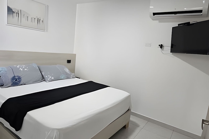 Imagen de la habitación del Hotel Apartaestudios San Fernando. Foto 9
