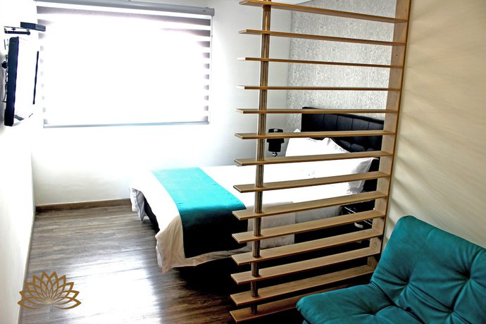 Imagen de la habitación del Hotel Apartahotel Boutique Central. Foto 2