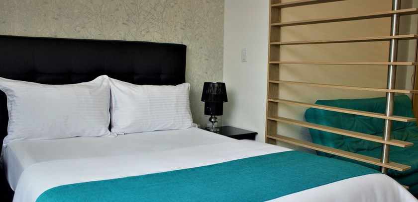 Imagen de la habitación del Hotel Apartahotel Boutique Central. Foto 7