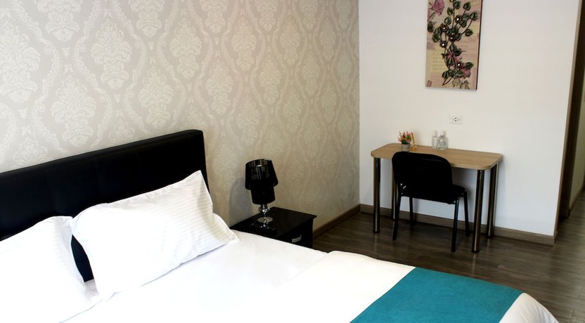 Imagen de la habitación del Hotel Apartahotel Boutique Central. Foto 13