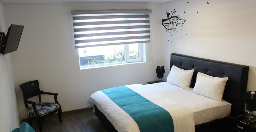 Imagen de la habitación del Hotel Apartahotel Boutique Central. Foto 20