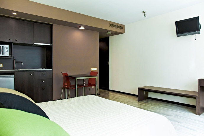 Imagen de la habitación del Hotel Apartahotel Centric. Foto 13