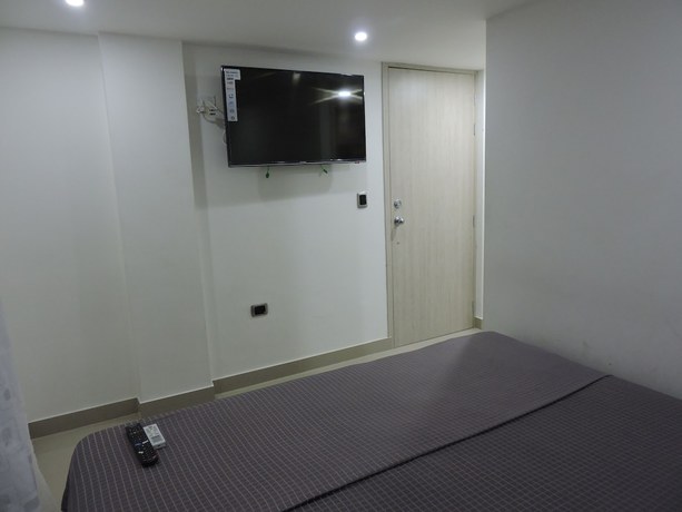 Imagen de la habitación del Hotel Apartahotel El Dorado. Foto 19