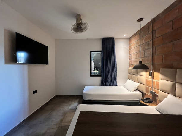 Imagen de la habitación del Hotel Apartahotel Medellin. Foto 9