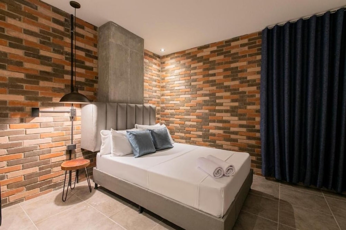 Imagen de la habitación del Hotel Apartahotel Medellin. Foto 10