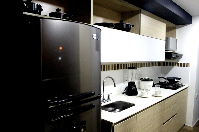 Imagen de la habitación del Hotel Apartahotel Millenials. Foto 10