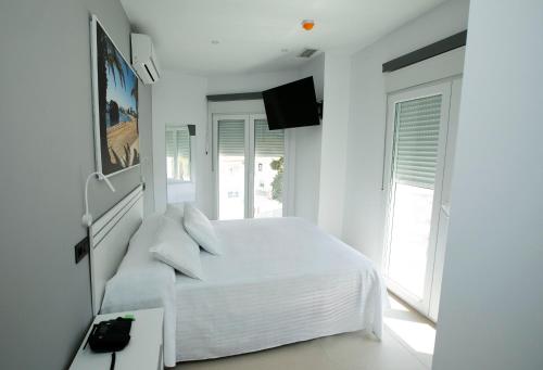 Imagen de la habitación del Hotel Apartahotel Puerto Blue. Foto 13