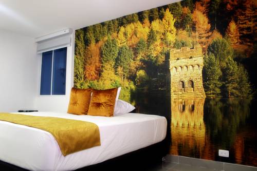 Imagen de la habitación del Hotel Apartahotel Tur&iacute;stico Jardines Del Caney. Foto 3