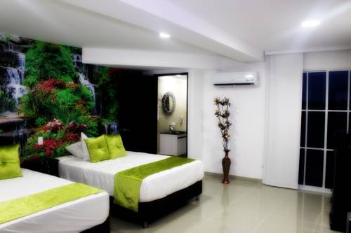 Imagen de la habitación del Hotel Apartahotel Tur&iacute;stico Jardines Del Caney. Foto 4