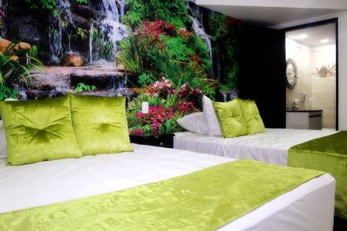 Imagen de la habitación del Hotel Apartahotel Tur&iacute;stico Jardines Del Caney. Foto 5