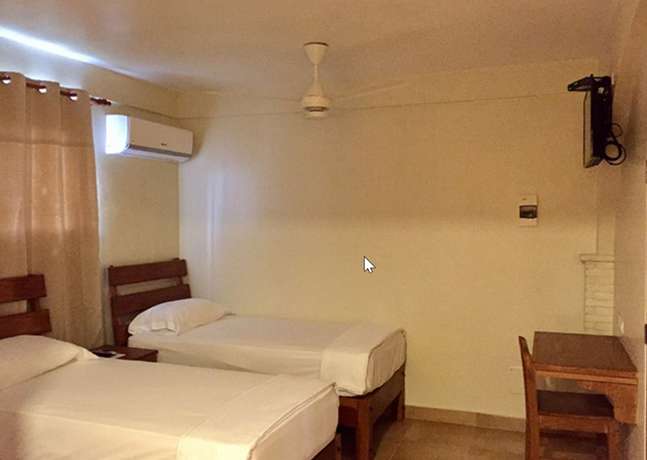 Imagen de la habitación del Hotel Apartahotel Yamili. Foto 7