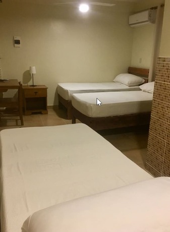 Imagen de la habitación del Hotel Apartahotel Yamili. Foto 13
