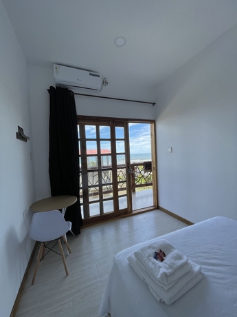 Imagen de la habitación del Hotel Apartahotel wanderlust. Foto 7