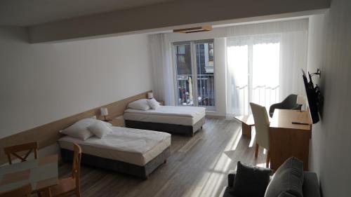Imagen de la habitación del Hotel Apartament Aparthotel Passage. Foto 16
